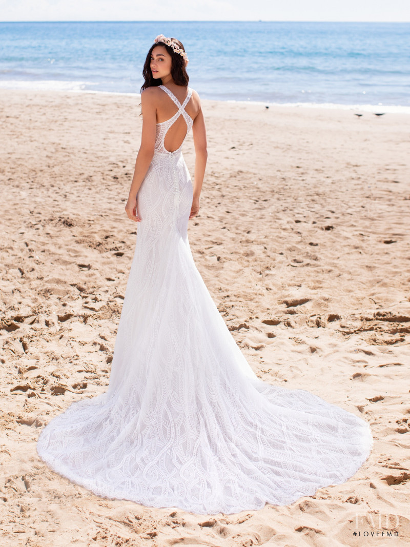 Zhenya Katava featured in  the Pronovias catalogue for Summer 2019