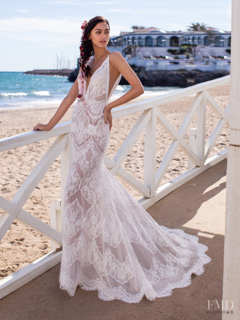 Zhenya Katava featured in  the Pronovias catalogue for Summer 2019