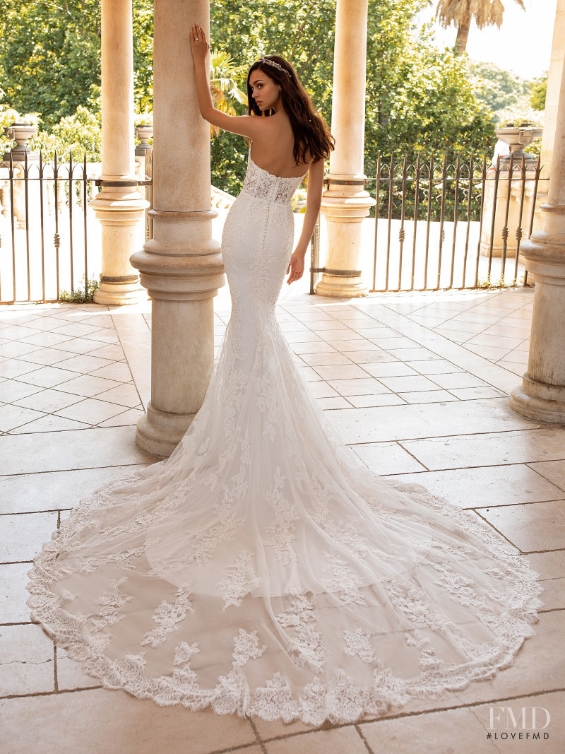 Zhenya Katava featured in  the Pronovias catalogue for Summer 2019