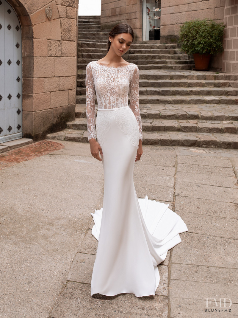 Zhenya Katava featured in  the Pronovias catalogue for Summer 2019