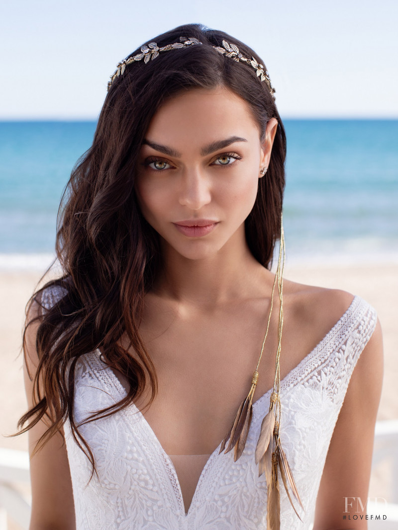 Zhenya Katava featured in  the Pronovias catalogue for Summer 2019