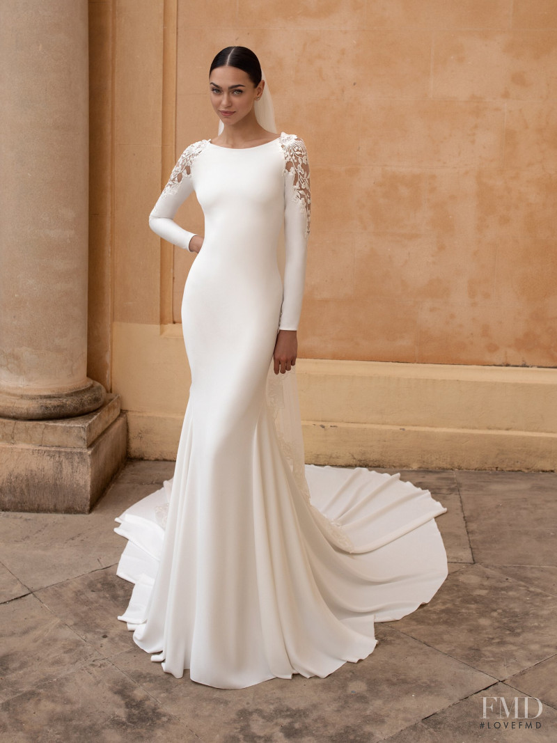 Zhenya Katava featured in  the Pronovias catalogue for Summer 2019