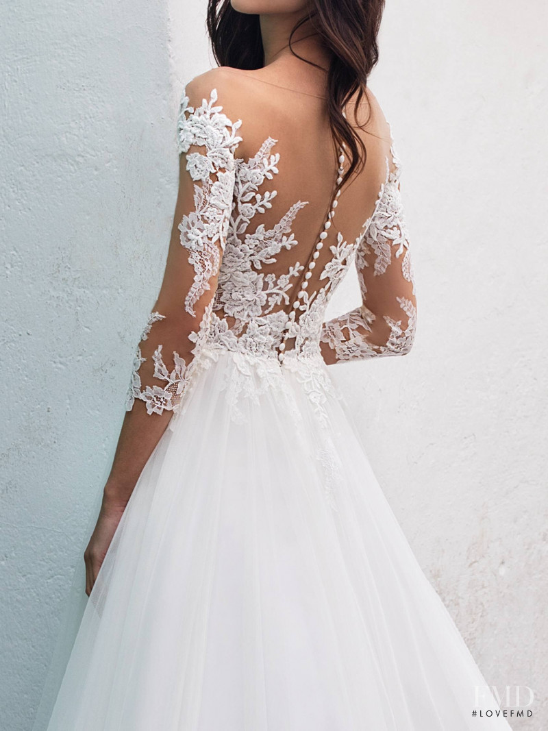 Zhenya Katava featured in  the Pronovias catalogue for Summer 2019