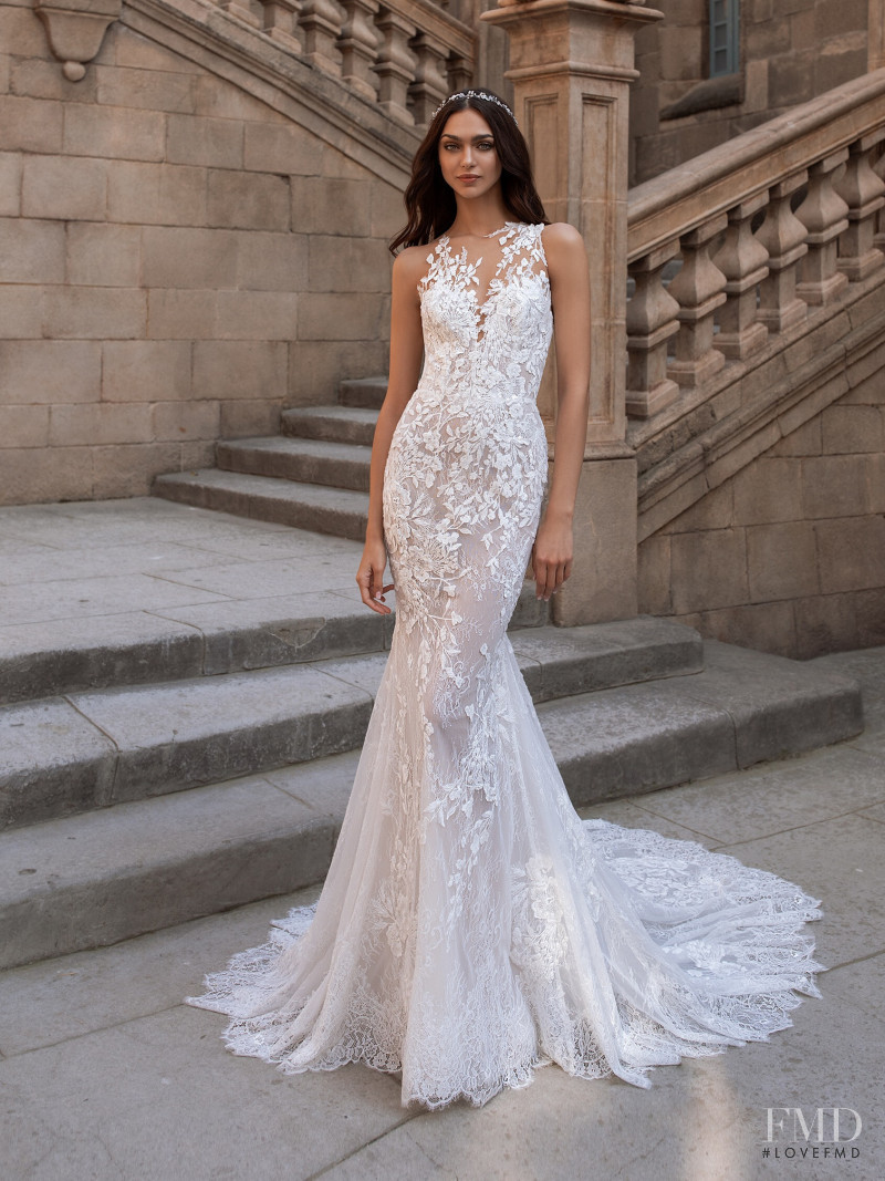 Zhenya Katava featured in  the Pronovias catalogue for Summer 2019