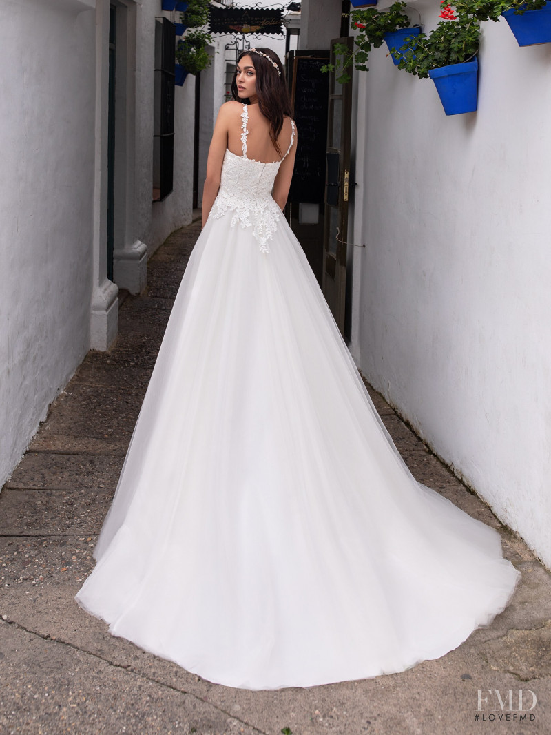 Zhenya Katava featured in  the Pronovias catalogue for Summer 2019