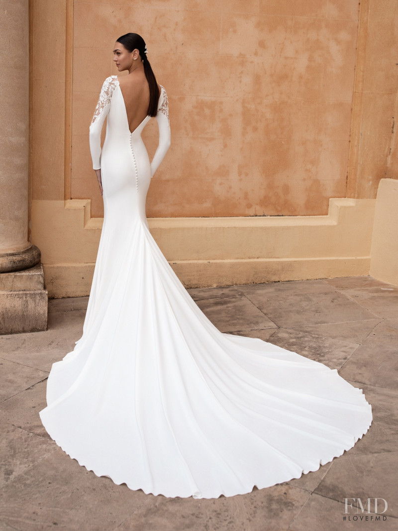 Zhenya Katava featured in  the Pronovias catalogue for Summer 2019