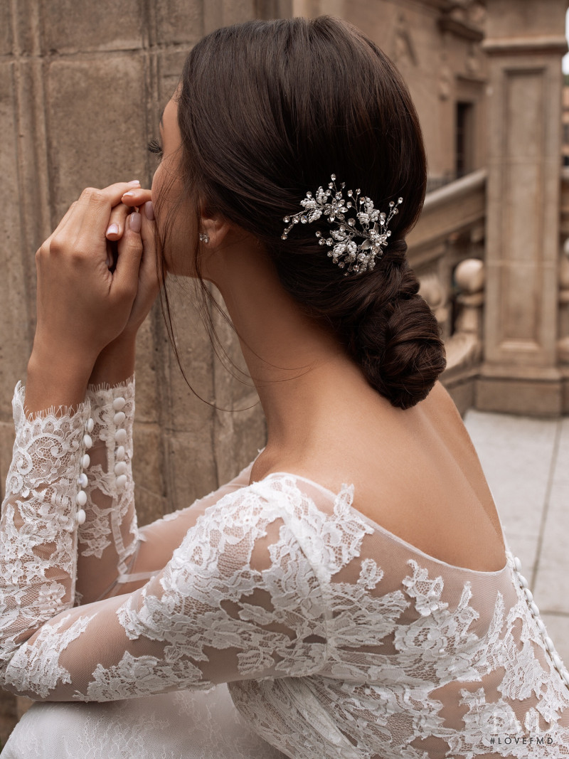 Zhenya Katava featured in  the Pronovias catalogue for Summer 2019