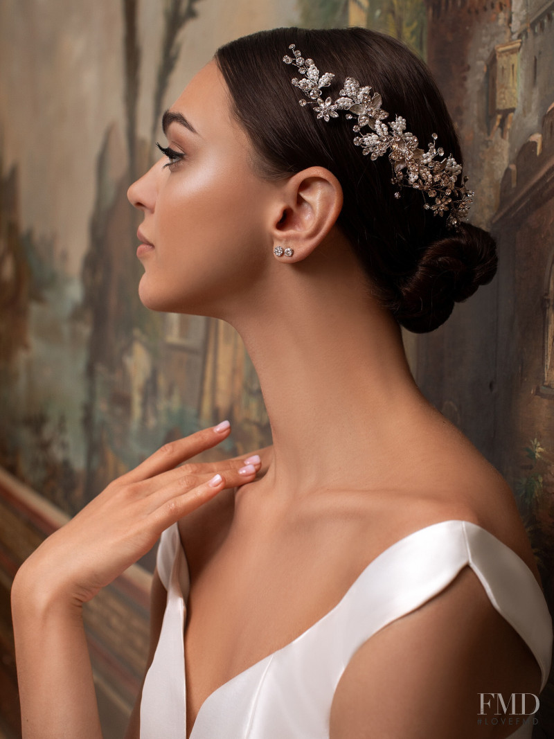 Zhenya Katava featured in  the Pronovias catalogue for Summer 2019