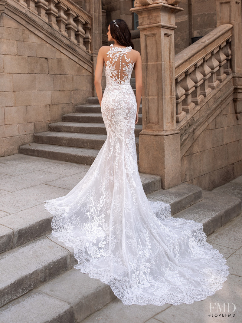 Zhenya Katava featured in  the Pronovias catalogue for Summer 2019