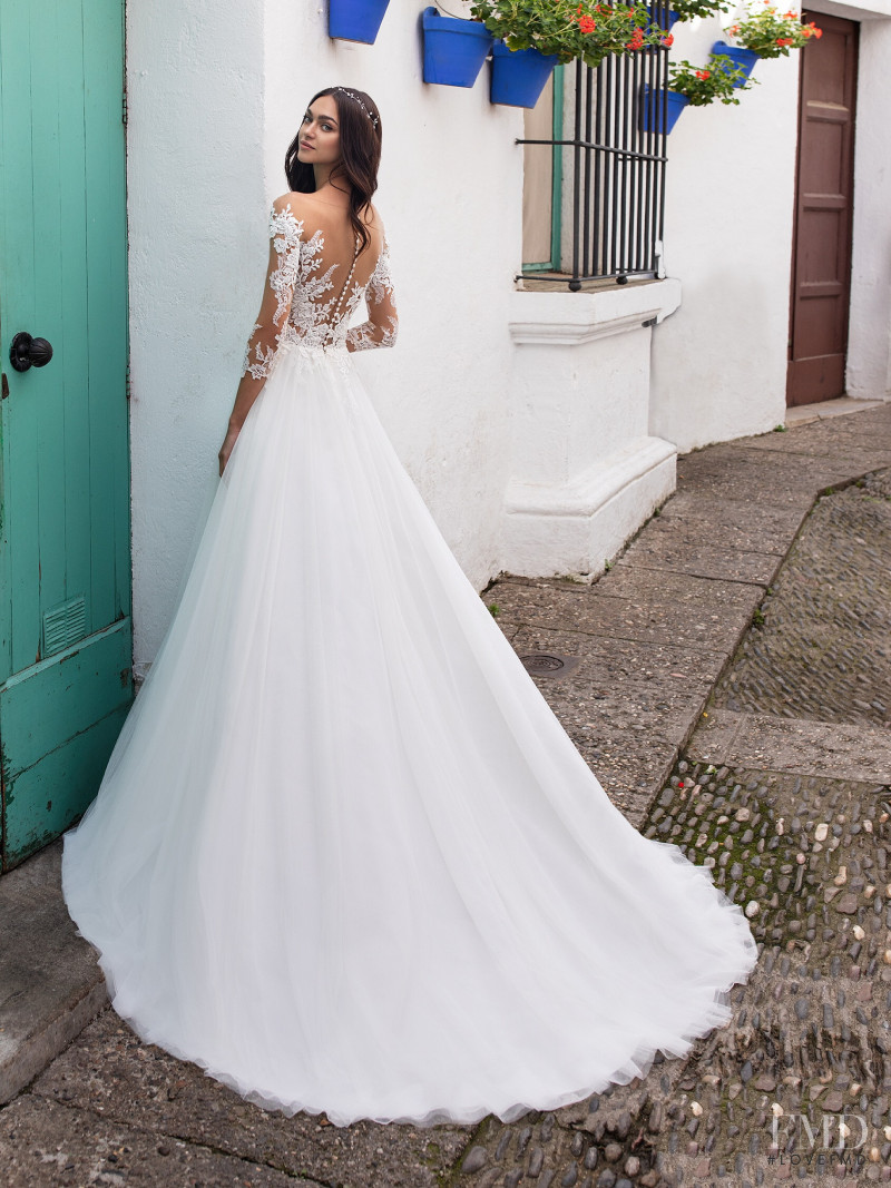 Zhenya Katava featured in  the Pronovias catalogue for Summer 2019