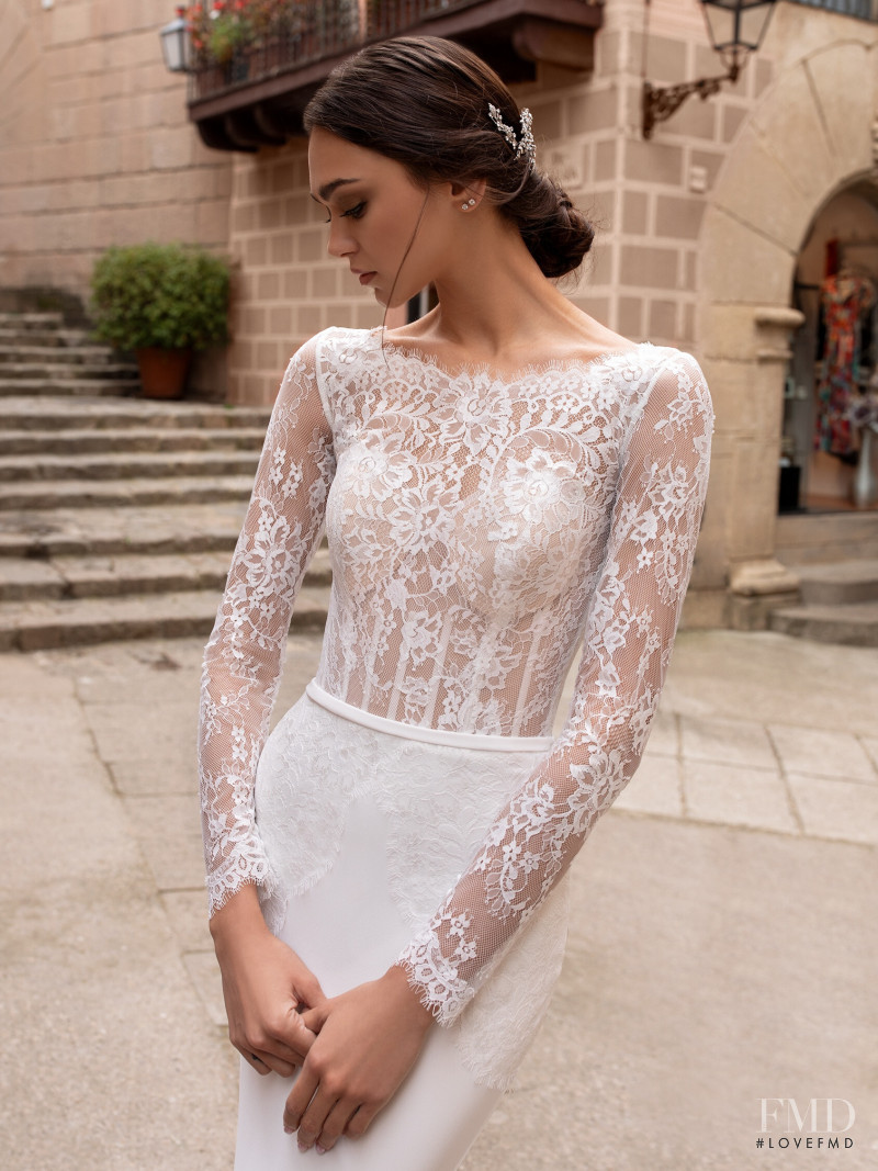 Zhenya Katava featured in  the Pronovias catalogue for Summer 2019