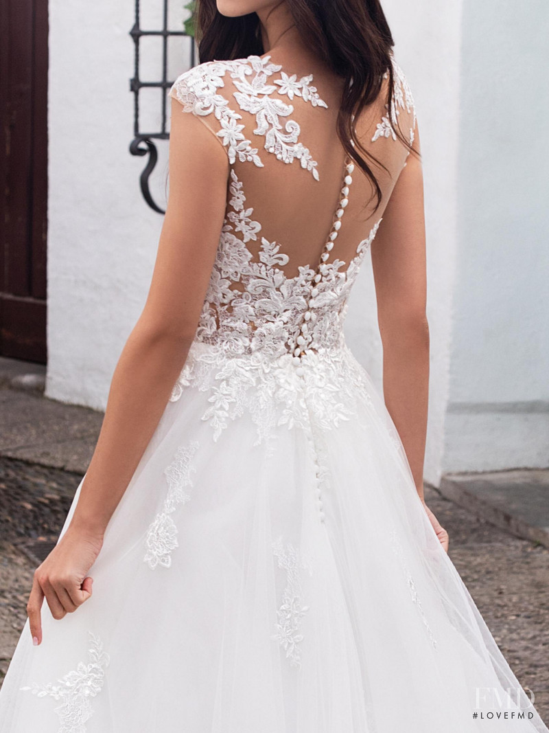 Zhenya Katava featured in  the Pronovias catalogue for Summer 2019