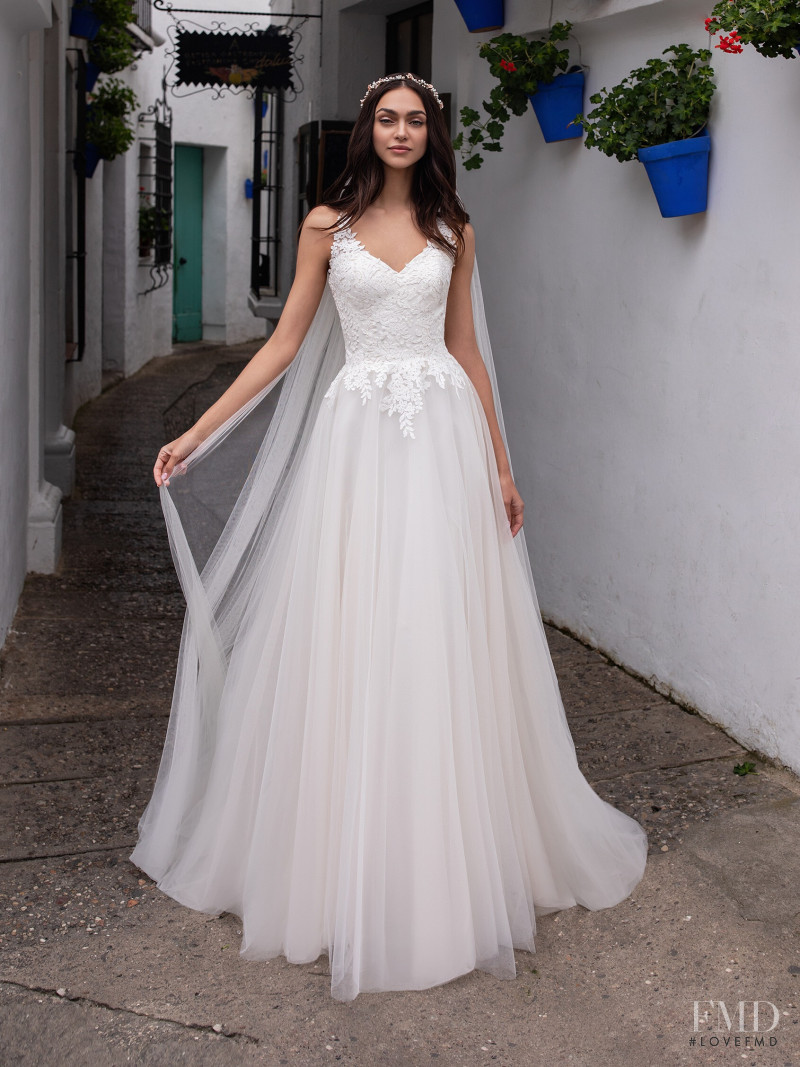 Zhenya Katava featured in  the Pronovias catalogue for Summer 2019