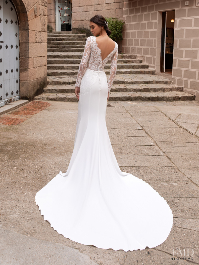 Zhenya Katava featured in  the Pronovias catalogue for Summer 2019