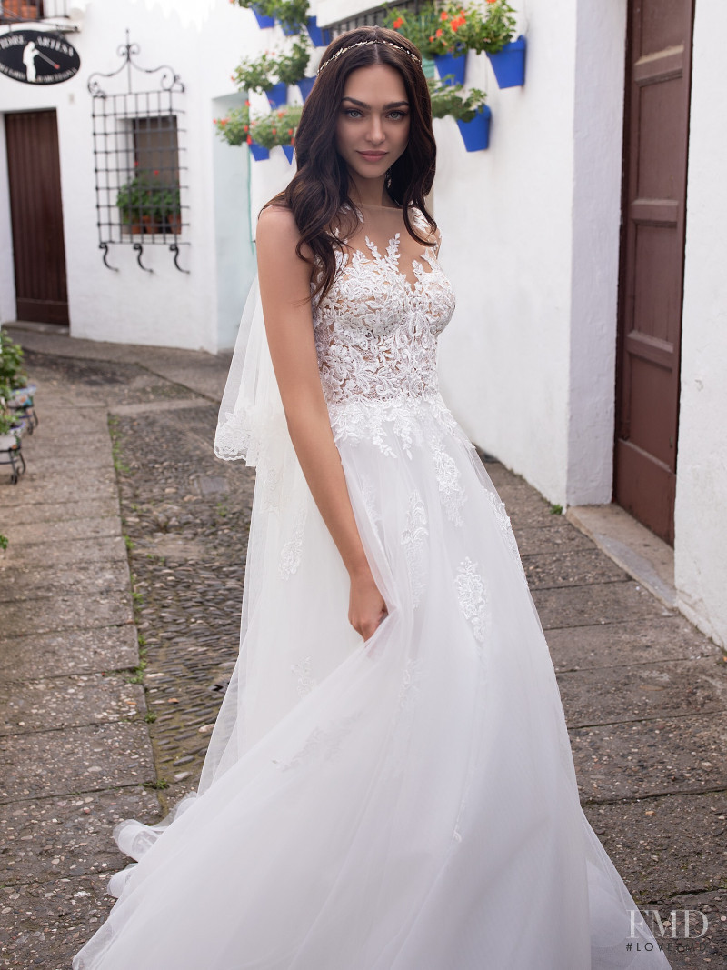 Zhenya Katava featured in  the Pronovias catalogue for Summer 2019