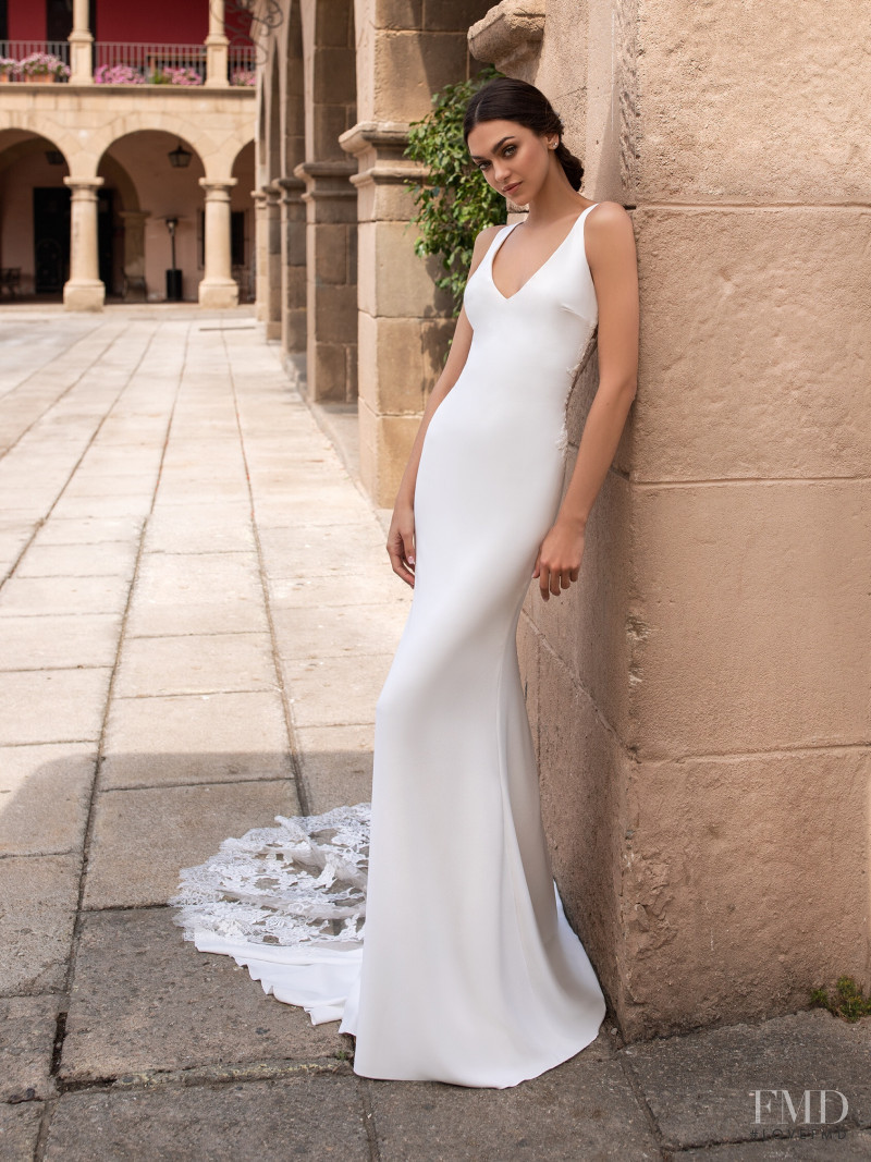 Zhenya Katava featured in  the Pronovias catalogue for Summer 2019