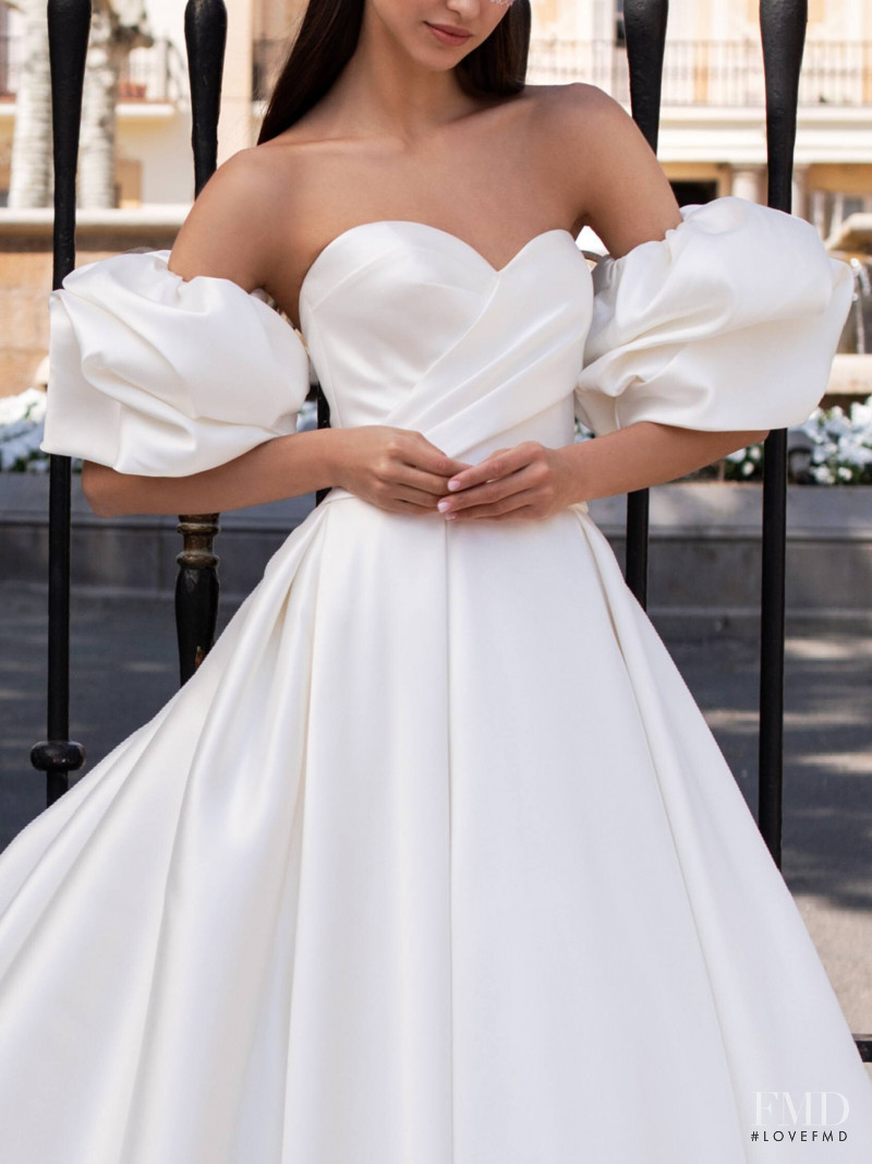 Zhenya Katava featured in  the Pronovias catalogue for Summer 2019