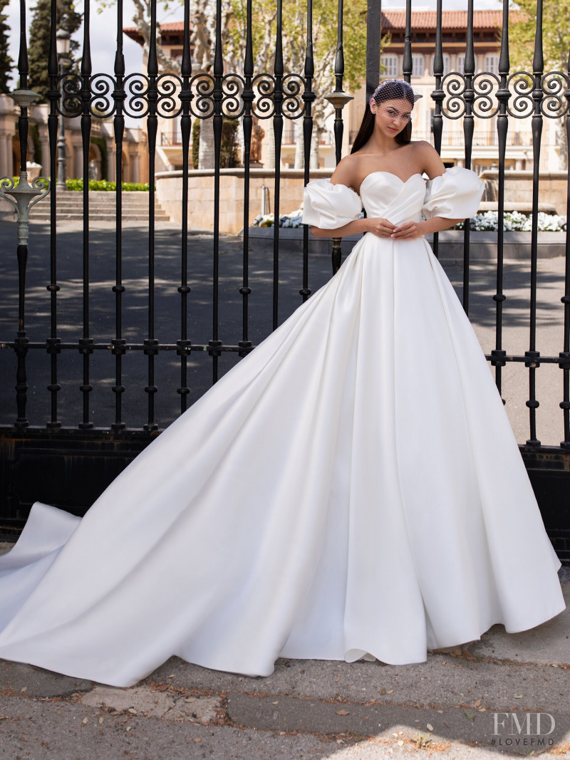 Zhenya Katava featured in  the Pronovias catalogue for Summer 2019