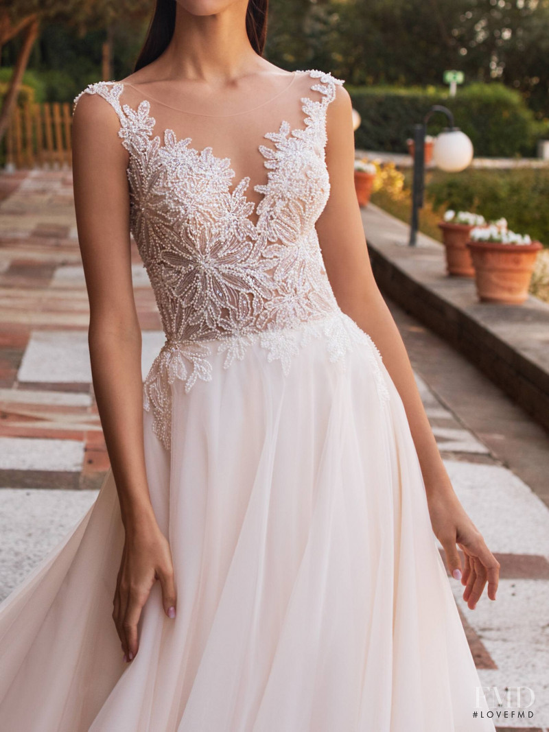 Zhenya Katava featured in  the Pronovias catalogue for Summer 2019