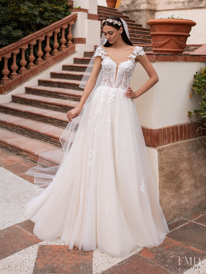 Zhenya Katava featured in  the Pronovias catalogue for Summer 2019