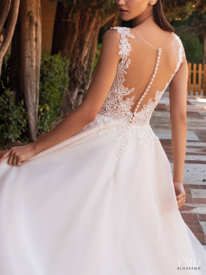 Zhenya Katava featured in  the Pronovias catalogue for Summer 2019