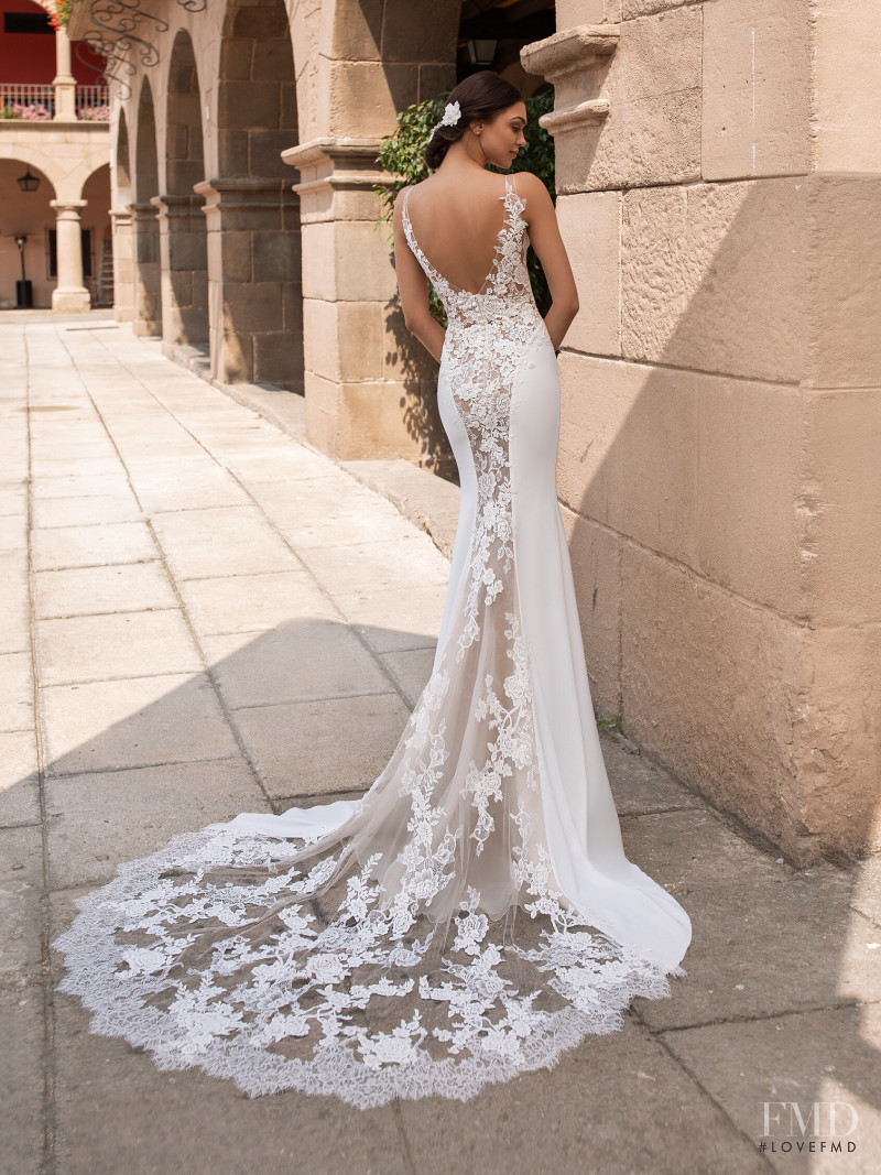 Zhenya Katava featured in  the Pronovias catalogue for Summer 2019