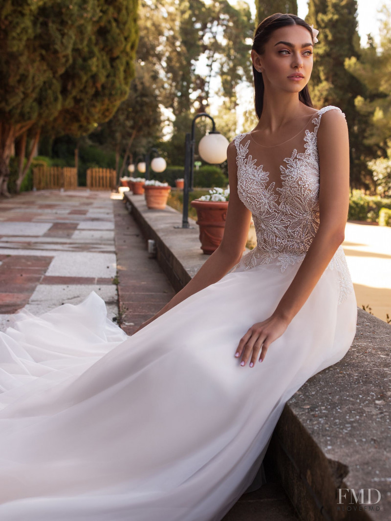 Zhenya Katava featured in  the Pronovias catalogue for Summer 2019