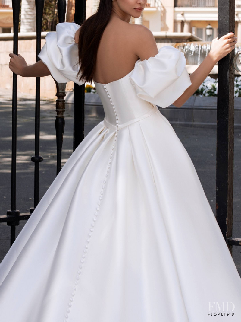 Zhenya Katava featured in  the Pronovias catalogue for Summer 2019