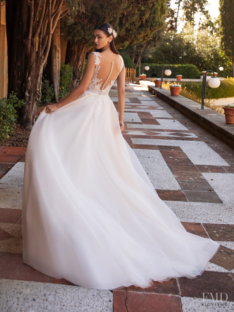 Zhenya Katava featured in  the Pronovias catalogue for Summer 2019