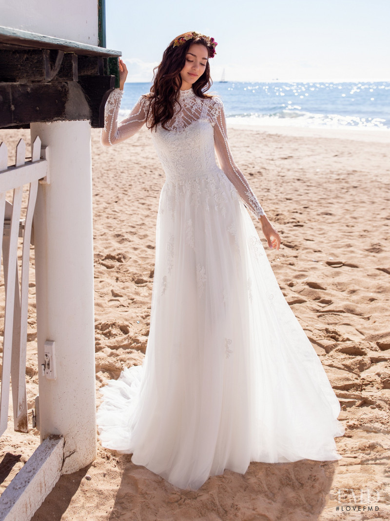 Zhenya Katava featured in  the Pronovias catalogue for Summer 2019