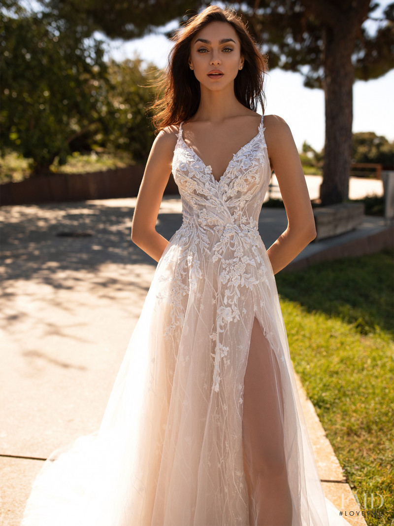 Zhenya Katava featured in  the Pronovias catalogue for Summer 2019