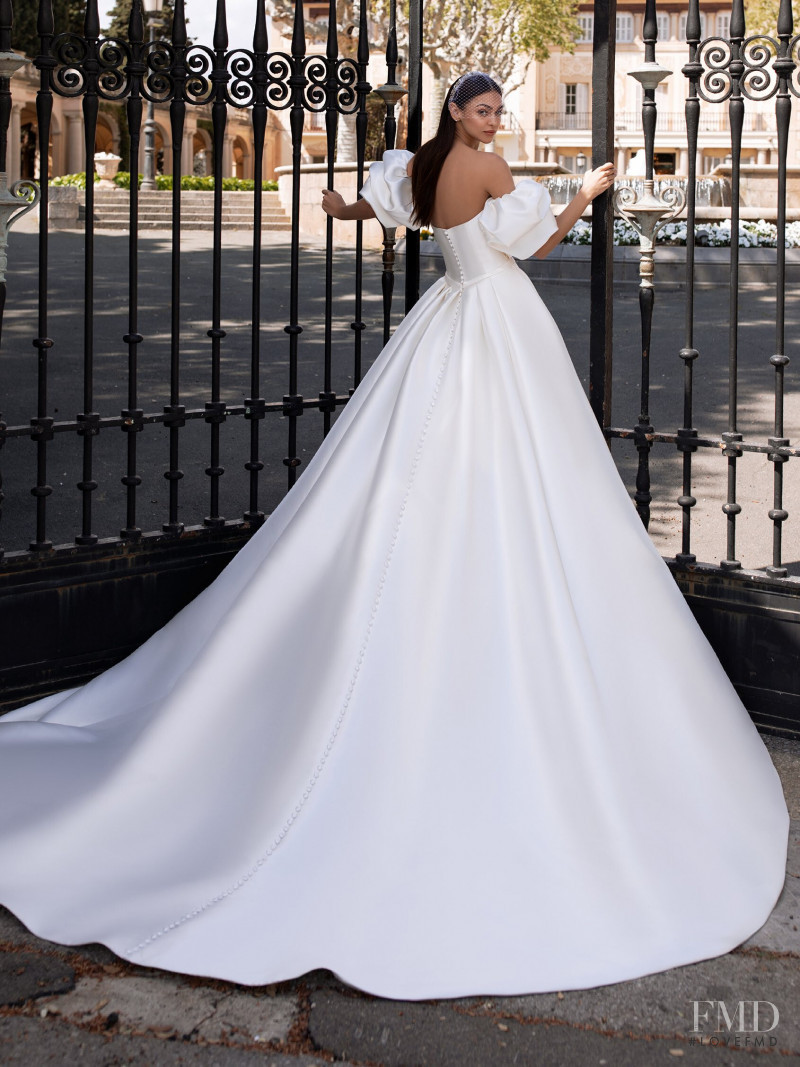 Zhenya Katava featured in  the Pronovias catalogue for Summer 2019