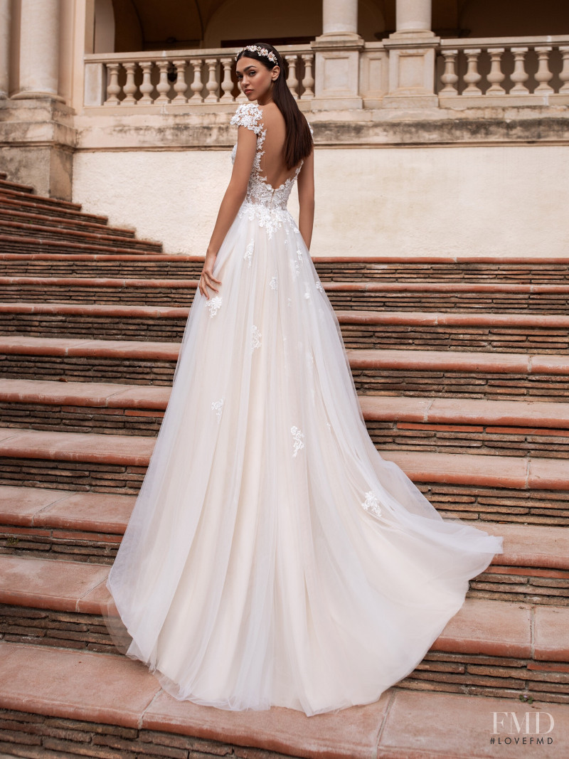 Zhenya Katava featured in  the Pronovias catalogue for Summer 2019