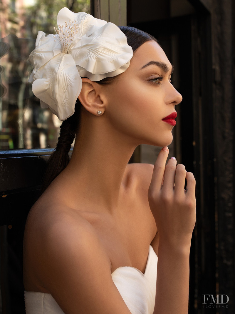 Zhenya Katava featured in  the Pronovias catalogue for Summer 2019