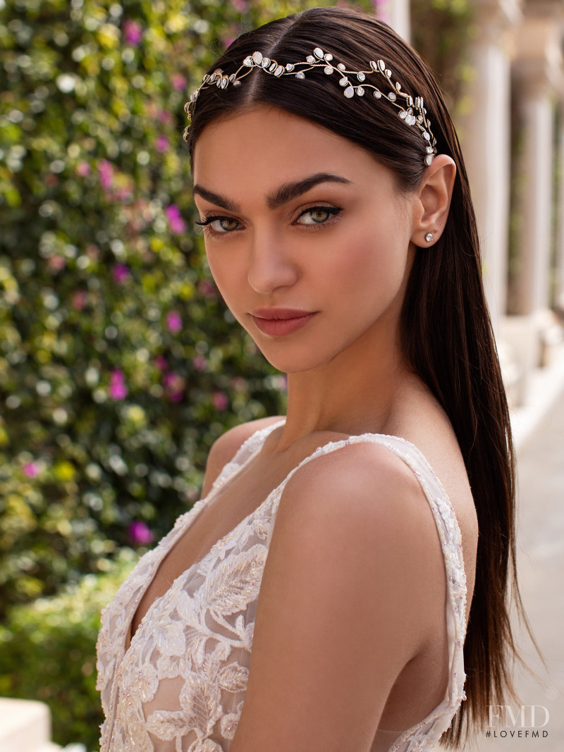 Zhenya Katava featured in  the Pronovias catalogue for Summer 2019