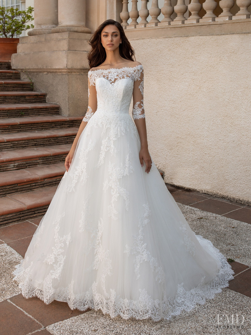 Zhenya Katava featured in  the Pronovias catalogue for Summer 2019