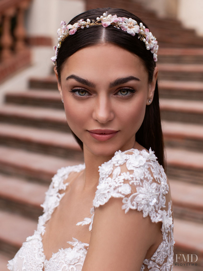 Zhenya Katava featured in  the Pronovias catalogue for Summer 2019