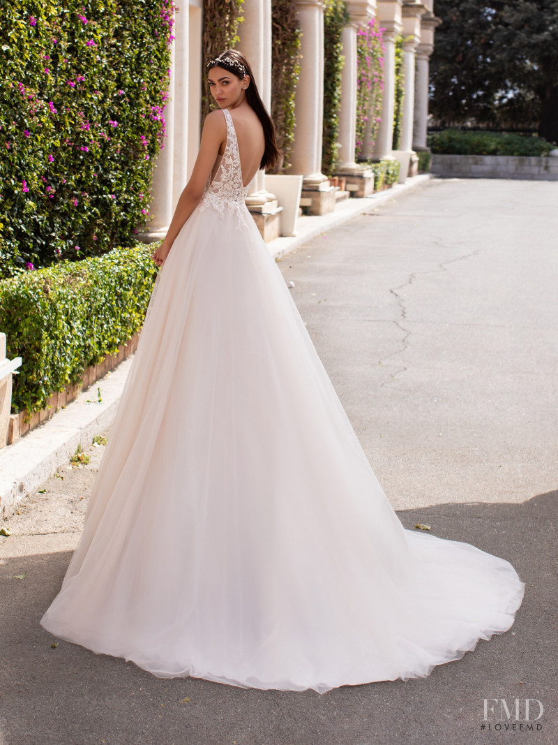 Zhenya Katava featured in  the Pronovias catalogue for Summer 2019