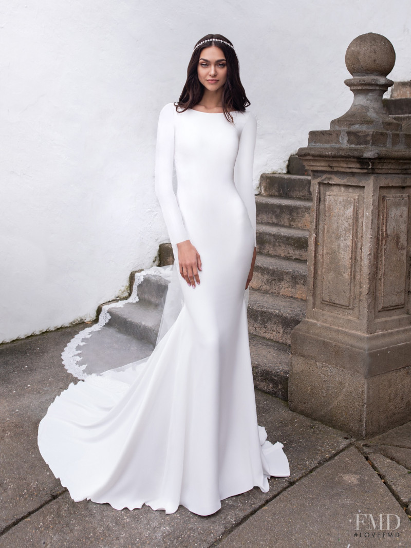 Zhenya Katava featured in  the Pronovias catalogue for Summer 2019