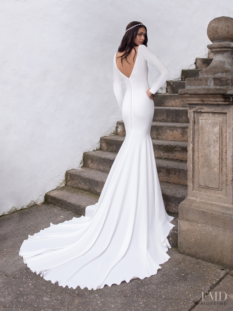 Zhenya Katava featured in  the Pronovias catalogue for Summer 2019