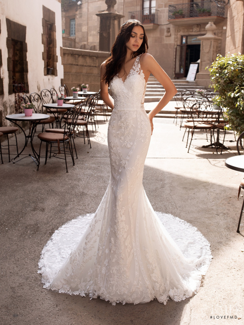 Zhenya Katava featured in  the Pronovias catalogue for Summer 2019