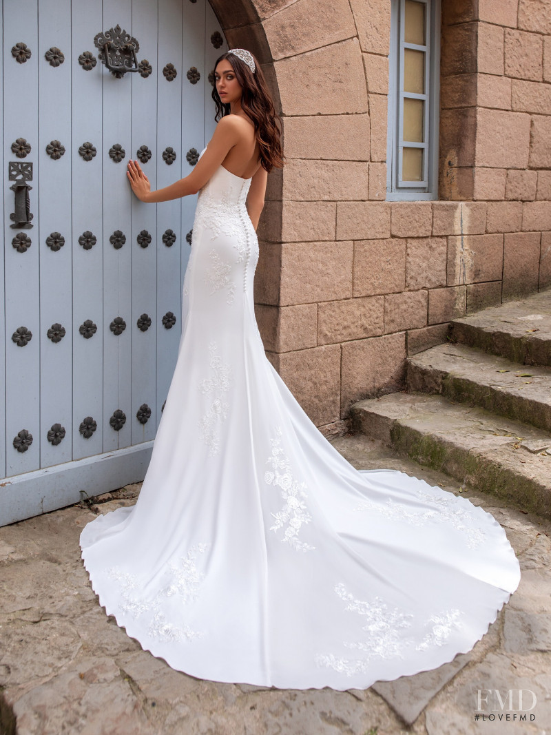 Zhenya Katava featured in  the Pronovias catalogue for Summer 2019