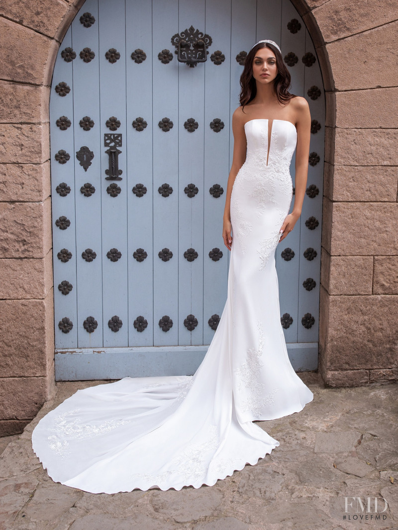 Zhenya Katava featured in  the Pronovias catalogue for Summer 2019