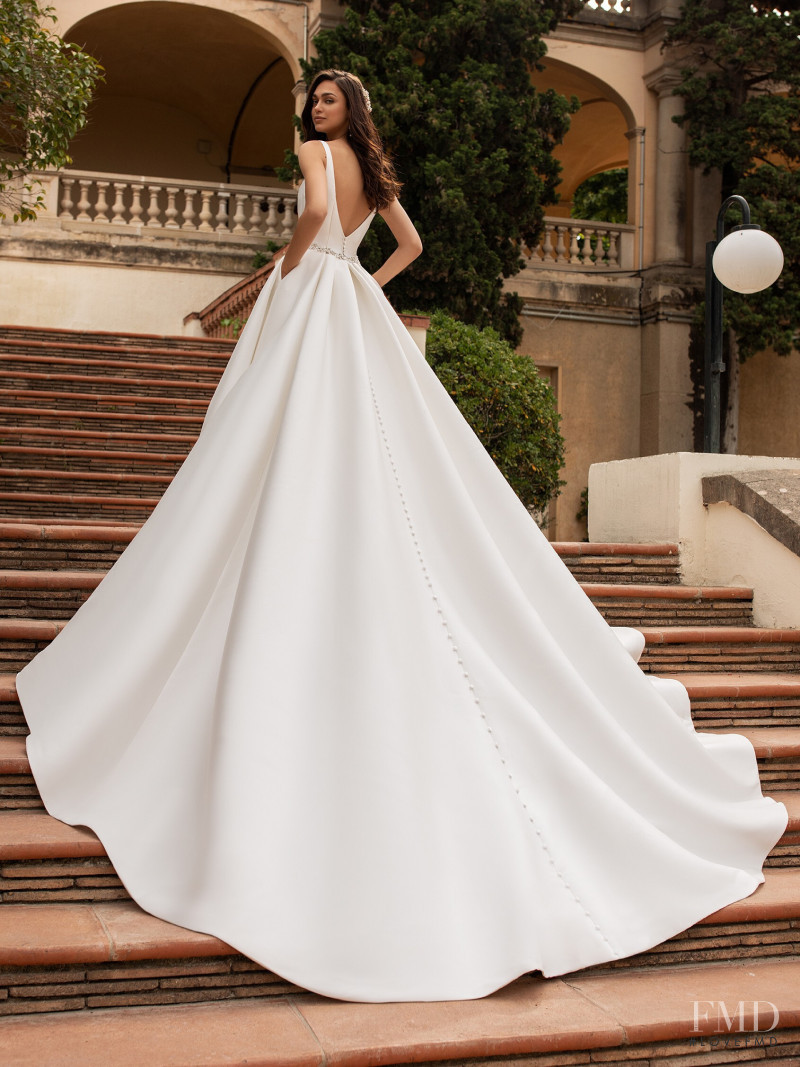 Zhenya Katava featured in  the Pronovias catalogue for Summer 2019