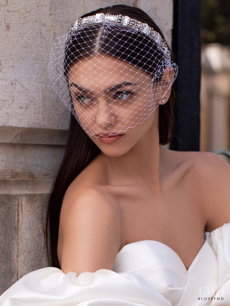 Zhenya Katava featured in  the Pronovias catalogue for Summer 2019