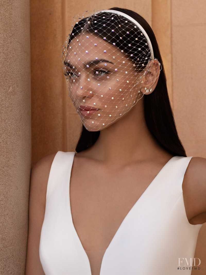 Zhenya Katava featured in  the Pronovias catalogue for Summer 2019