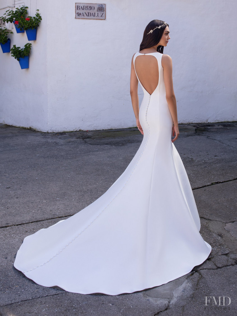 Zhenya Katava featured in  the Pronovias catalogue for Summer 2019