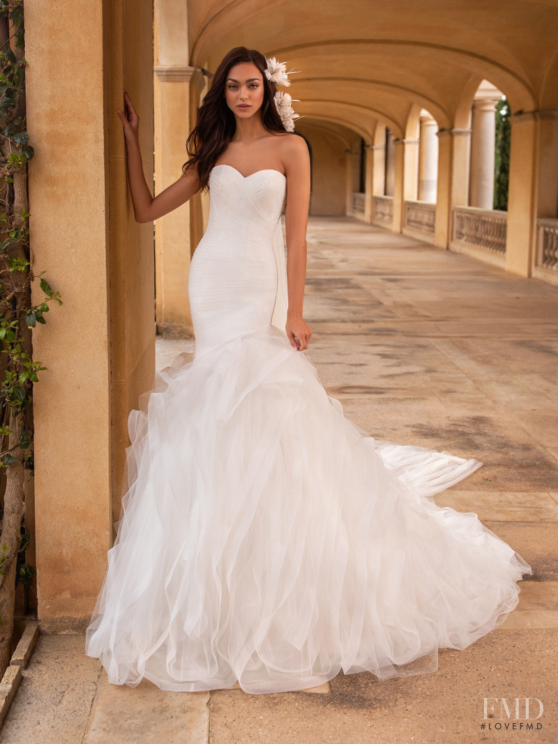 Zhenya Katava featured in  the Pronovias catalogue for Summer 2019