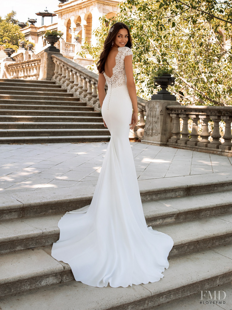 Zhenya Katava featured in  the Pronovias catalogue for Summer 2019