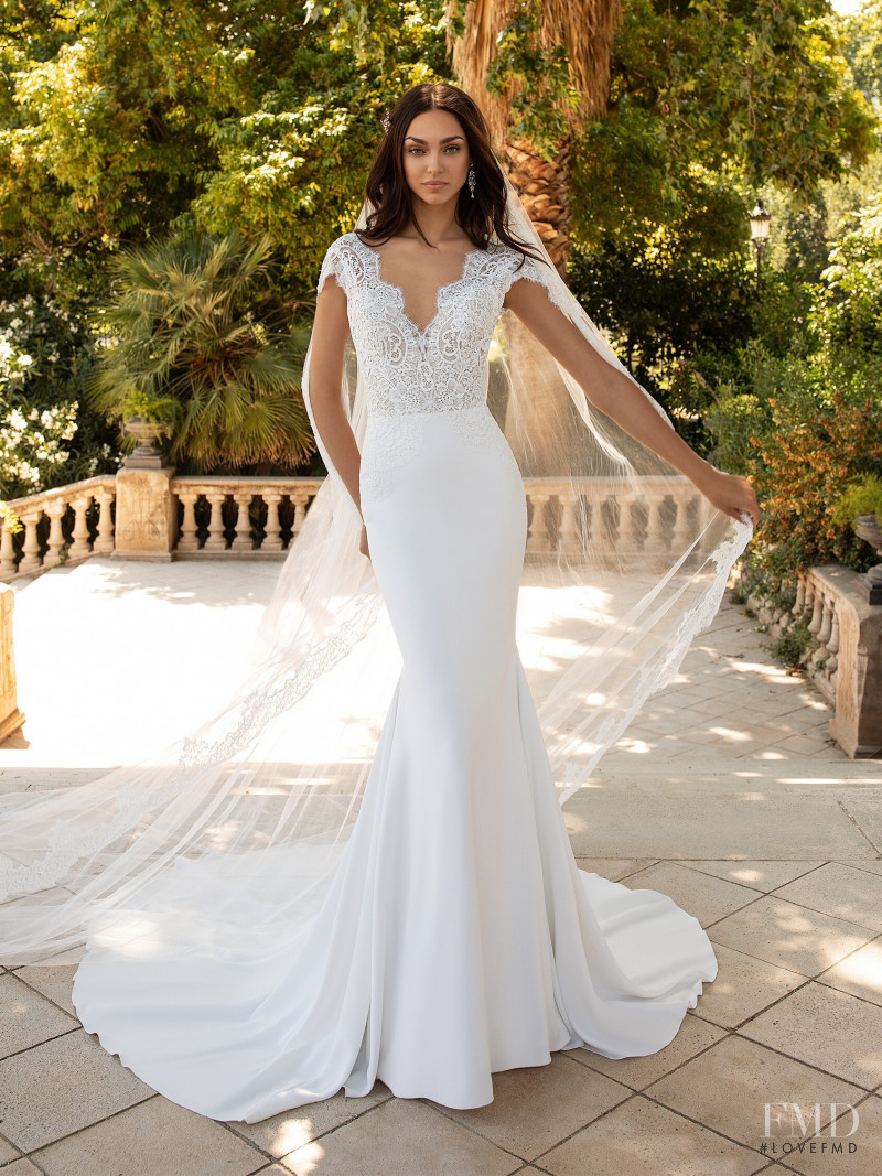 Zhenya Katava featured in  the Pronovias catalogue for Summer 2019